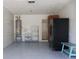 Garage with ample storage and a refrigerator at 10118 Allenby Ct, Orlando, FL 32821