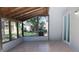Covered patio with tiled floor and view of the backyard at 10118 Allenby Ct, Orlando, FL 32821