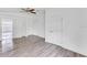 Bright bedroom featuring new flooring and ample closet space at 1142 Grayson Dr, Orlando, FL 32825
