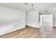 Bright dining room with hardwood floors and view into living room at 1142 Grayson Dr, Orlando, FL 32825