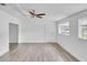 Living room featuring wood-look floors and ceiling fan at 1142 Grayson Dr, Orlando, FL 32825