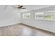 Bright living room with ceiling fan and wood-look flooring at 1142 Grayson Dr, Orlando, FL 32825
