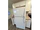 White Whirlpool refrigerator in updated kitchen at 1142 Grayson Dr, Orlando, FL 32825