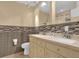 Bathroom with double vanity and updated tile at 126 Se 41St Ave, Ocala, FL 34471