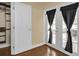 Bedroom with double doors leading to backyard at 126 Se 41St Ave, Ocala, FL 34471
