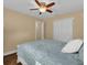 Bedroom with ceiling fan, double door closet and hardwood floors at 126 Se 41St Ave, Ocala, FL 34471