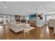 Bright living room with hardwood floors, fireplace, and ample seating at 126 Se 41St Ave, Ocala, FL 34471