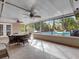 Relaxing screened-in pool area with patio furniture at 126 Se 41St Ave, Ocala, FL 34471