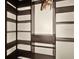 Spacious walk-in closet with ample shelving at 126 Se 41St Ave, Ocala, FL 34471