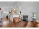 The living space features a large staircase, wood floors, and neutral-toned furniture at 127 Westmoreland Cir, Kissimmee, FL 34744