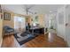 Brightly lit office with hardwood flooring, and large window for natural light at 127 Westmoreland Cir, Kissimmee, FL 34744