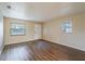 Inviting living room boasts hardwood floors, neutral paint, and plenty of natural light, creating a warm atmosphere at 1335 Lescot Ln, Orlando, FL 32811