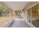 This screened in back patio is a great place to enjoy the view and avoid insects at 1335 Lescot Ln, Orlando, FL 32811