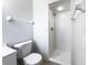 Clean bathroom with a shower and white tile at 1375 Sacramento St, Deltona, FL 32725