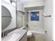 Clean bathroom, featuring a bathtub and granite countertop at 1375 Sacramento St, Deltona, FL 32725