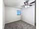 Bright bedroom with ceiling fan and neutral carpeting at 1375 Sacramento St, Deltona, FL 32725
