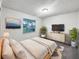 Relaxing bedroom with a cozy bed and plenty of natural light at 1375 Sacramento St, Deltona, FL 32725