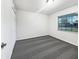 Well-lit bedroom, featuring a large window and closet at 1375 Sacramento St, Deltona, FL 32725