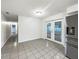 Bright dining area with French doors to backyard at 1375 Sacramento St, Deltona, FL 32725