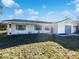 House exterior showcasing a covered porch and landscaping at 1375 Sacramento St, Deltona, FL 32725
