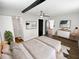 Main bedroom with walk-in closet, hardwood floors, and ceiling fan at 14421 Parker Rd, Orlando, FL 32832