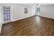Large bedroom with wood-look floors and access to a patio at 14421 Parker Rd, Orlando, FL 32832