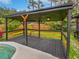 Covered patio with wooden pergola at 14421 Parker Rd, Orlando, FL 32832