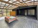 Screened porch with swing and view at 14421 Parker Rd, Orlando, FL 32832