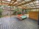 Relaxing screened porch with swing at 14421 Parker Rd, Orlando, FL 32832