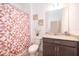 Clean bathroom with a shower/tub combo and updated vanity at 1550 Outback Rd, St Cloud, FL 34771