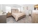 Main bedroom with plush bed, ample nightstands, and large windows at 1550 Outback Rd, St Cloud, FL 34771