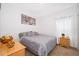 Guest bedroom with a double bed and wood dresser at 1550 Outback Rd, St Cloud, FL 34771