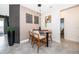 Casual dining area with wood table and chairs, near the kitchen at 1550 Outback Rd, St Cloud, FL 34771