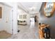 Bright and spacious entryway with tile flooring, leading to living areas at 1550 Outback Rd, St Cloud, FL 34771