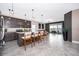 Modern kitchen with dark cabinets, granite counters, and island at 1550 Outback Rd, St Cloud, FL 34771