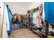 Large walk-in closet with ample hanging space and shelving at 1550 Outback Rd, St Cloud, FL 34771