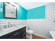 Stylish bathroom with subway tile, marble vanity, and clawfoot tub at 1601 New York Ave., St Cloud, FL 34769