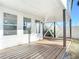 Enjoy this large back patio with wooden deck and modern design at 17 S Oleander Ave, Daytona Beach, FL 32118