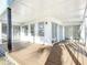 Spacious back patio with wood deck and sliding glass doors at 17 S Oleander Ave, Daytona Beach, FL 32118