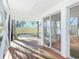 Wooden deck with sliding glass doors leading to backyard at 17 S Oleander Ave, Daytona Beach, FL 32118