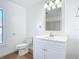 Clean bathroom with white vanity and tiled shower at 17 S Oleander Ave, Daytona Beach, FL 32118