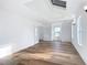 Hardwood floor bedroom with French doors and skylights at 17 S Oleander Ave, Daytona Beach, FL 32118