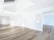 Open concept bedroom with hardwood floors and French doors at 17 S Oleander Ave, Daytona Beach, FL 32118