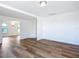 Hardwood floor bedroom with access to other rooms at 17 S Oleander Ave, Daytona Beach, FL 32118