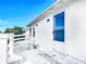 White deck with door leading to the house at 17 S Oleander Ave, Daytona Beach, FL 32118