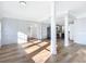 Open concept kitchen with stainless steel appliances and light wood floors at 17 S Oleander Ave, Daytona Beach, FL 32118