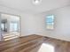 Bright living room with hardwood floors and white walls at 17 S Oleander Ave, Daytona Beach, FL 32118