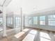Bright living room with hardwood floors and sunlit windows at 17 S Oleander Ave, Daytona Beach, FL 32118