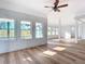 Spacious living area featuring hardwood floors and lots of natural light at 17 S Oleander Ave, Daytona Beach, FL 32118