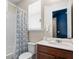 Bathroom with tub, shower, toilet and vanity at 1808 Sandy Park Trl, Kissimmee, FL 34747